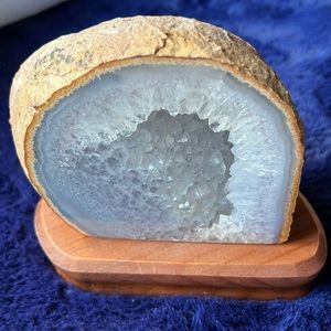 Polished agate geode on base